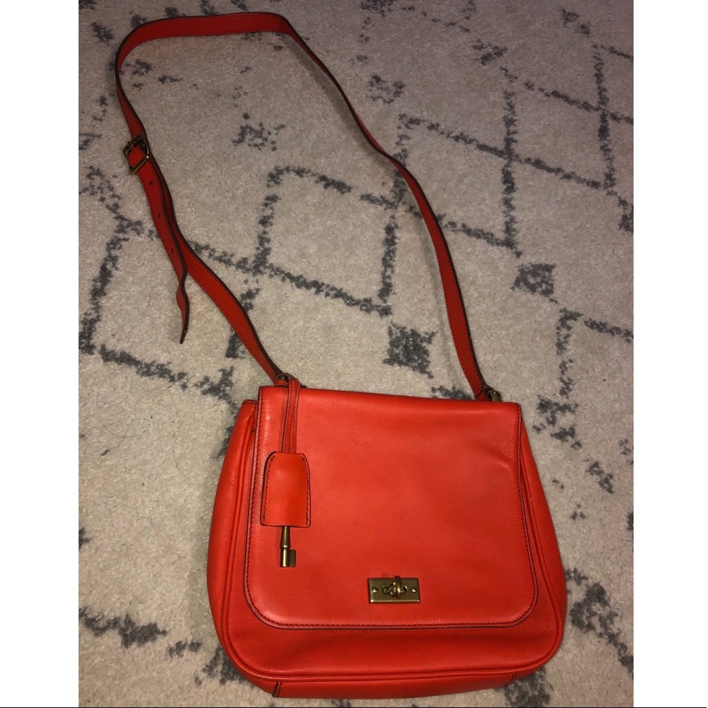 Orange Fossil crossbody bag.